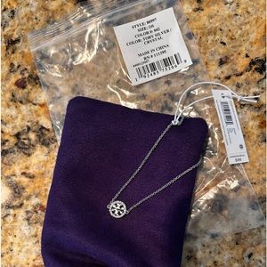 Brand new bracelet Tory Burch - silver with TB logo on crystals on wrist